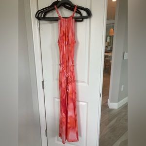 Tommy Bahama summer dress with side slits and pockets on both sides.